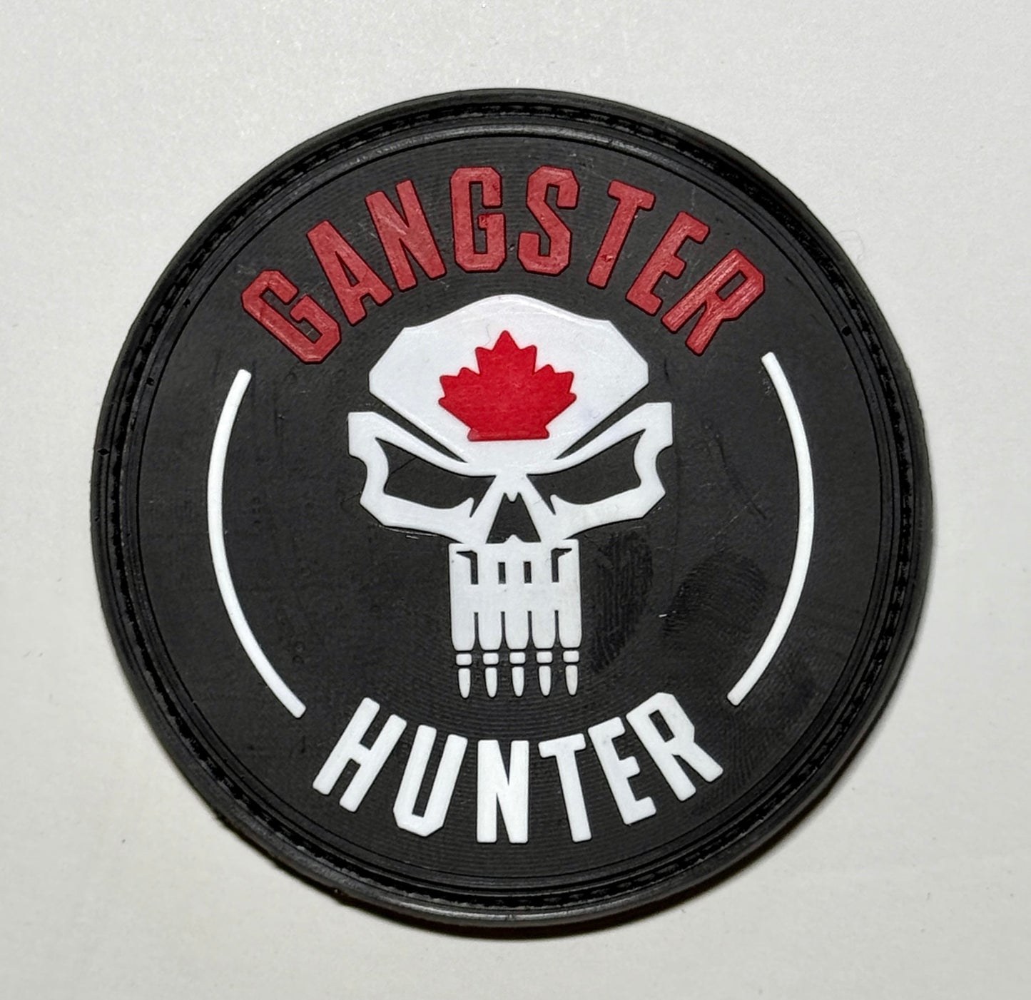 Gangster Hunter -With Skull 3" Round